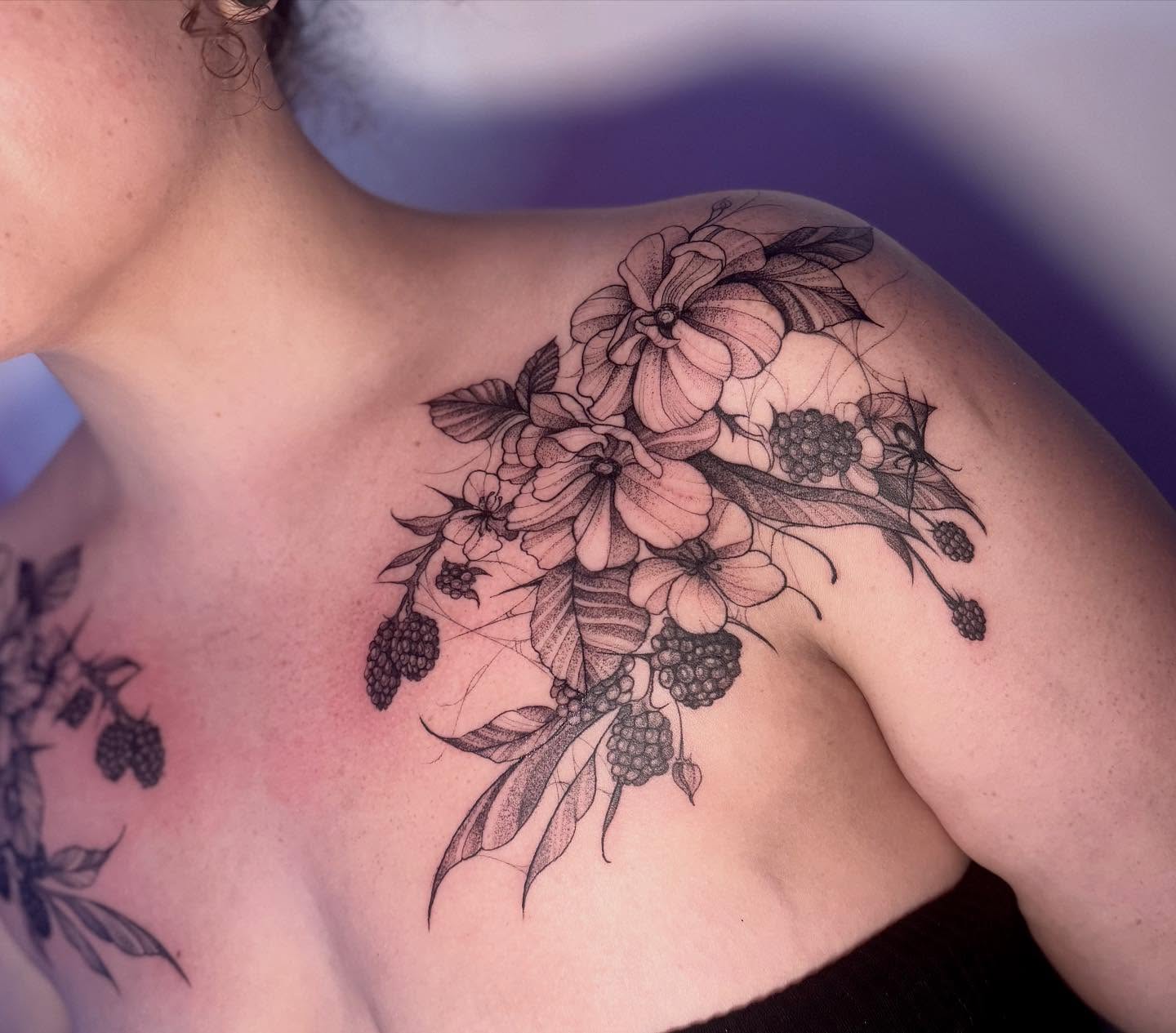 Floral bouquet dotwork tattoo on the shoulder by Claire Litsey