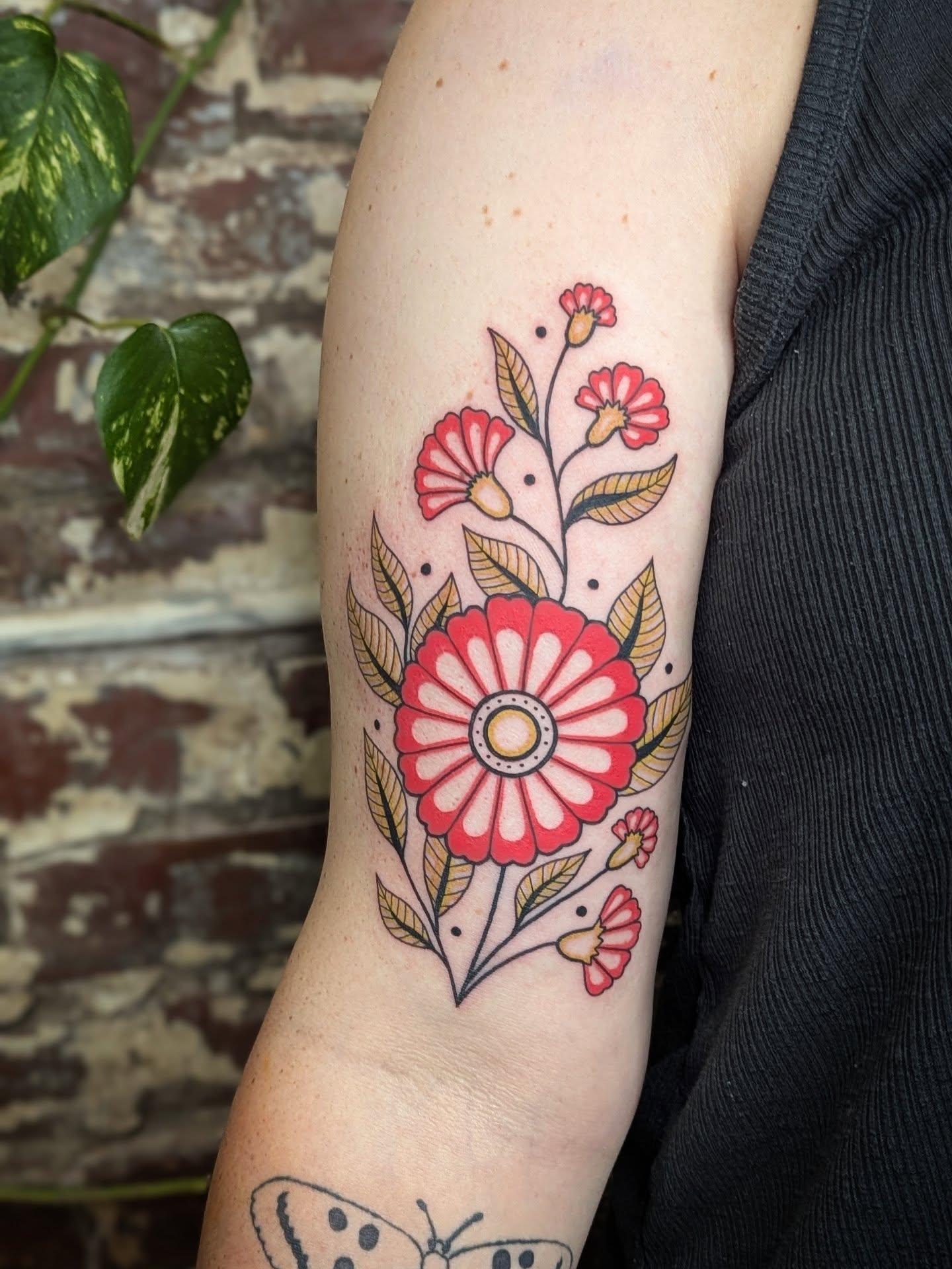 Floral arrangement dotwork tattoo on the forearm by Eli Studer