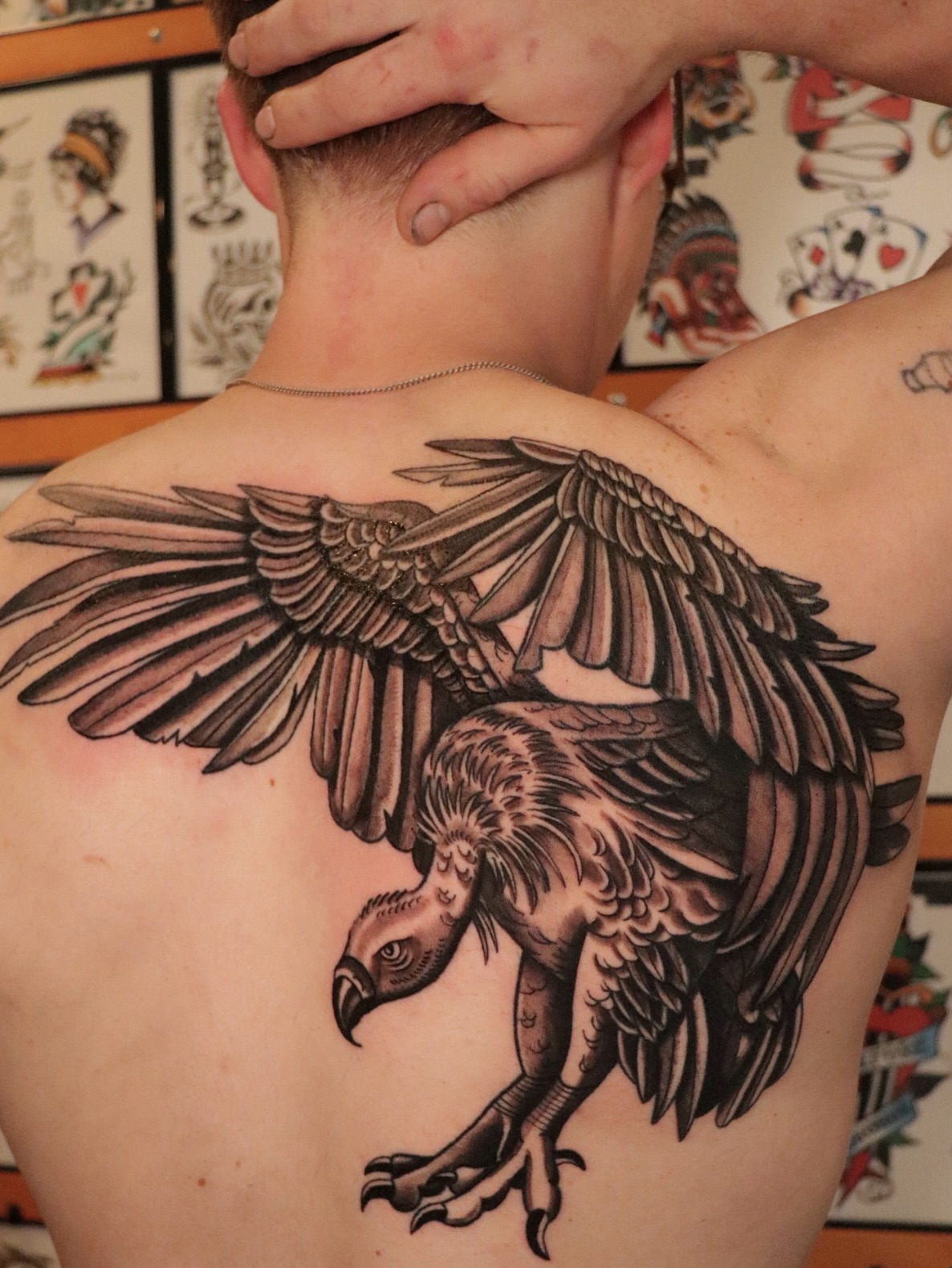 Vulture black and grey tattoo on the back by Dylan Mott