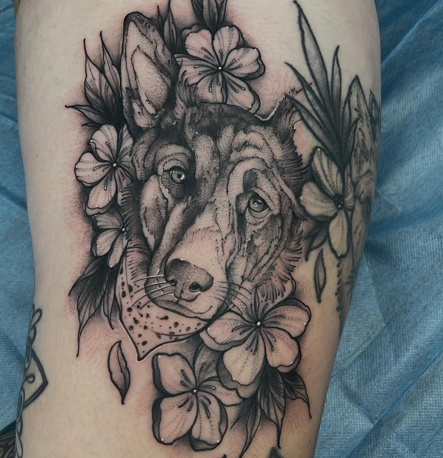 Dog with flowers dotwork tattoo on the forearm by Brandon Mola, Chicago, Illinois