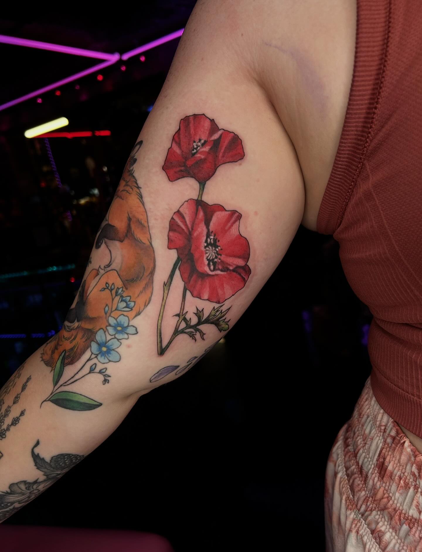 Red poppies realism tattoo on the forearm by Tattoos by Abbey
