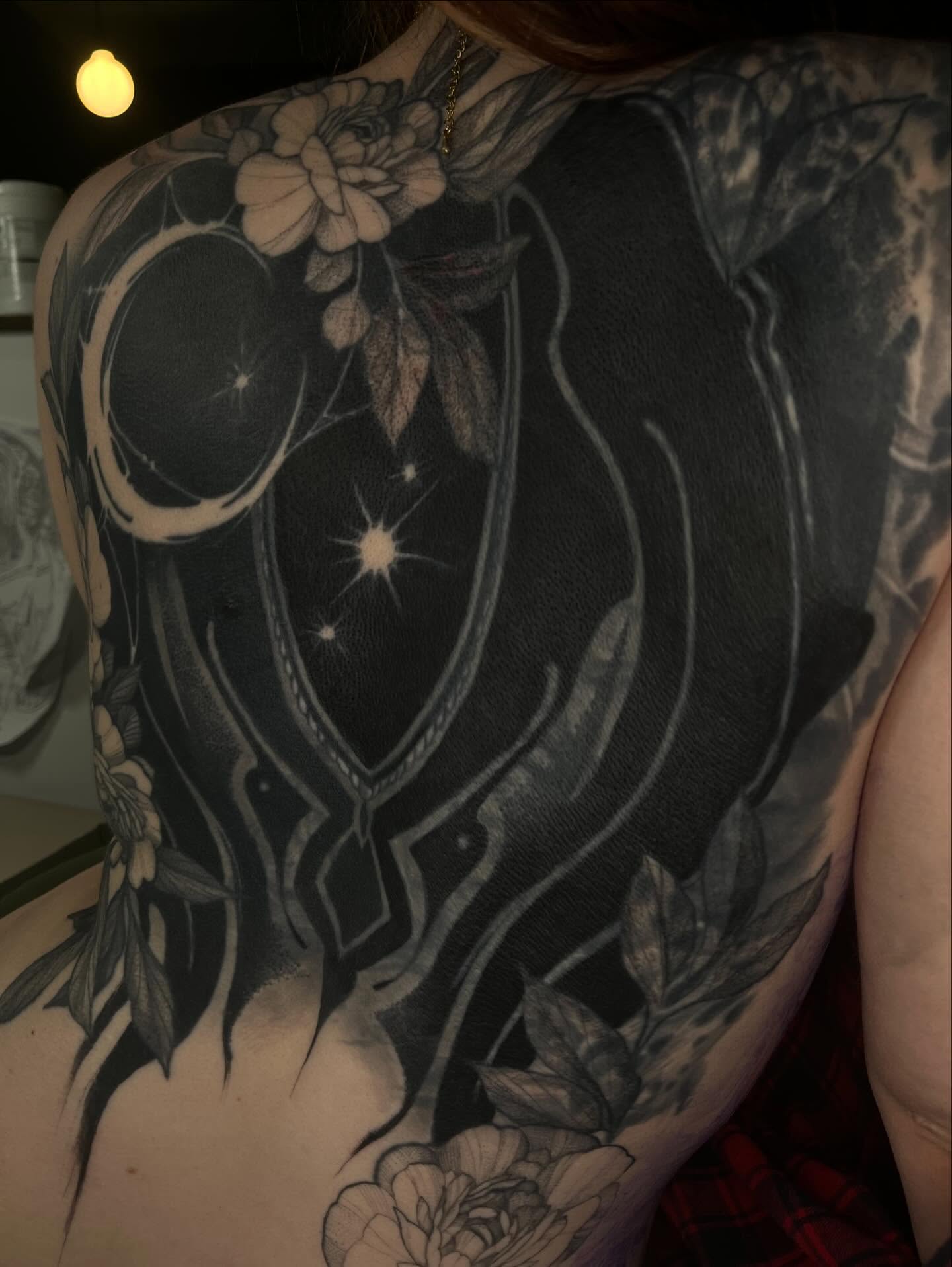 Astral portal geometric tattoo on the back by Amber Miracle