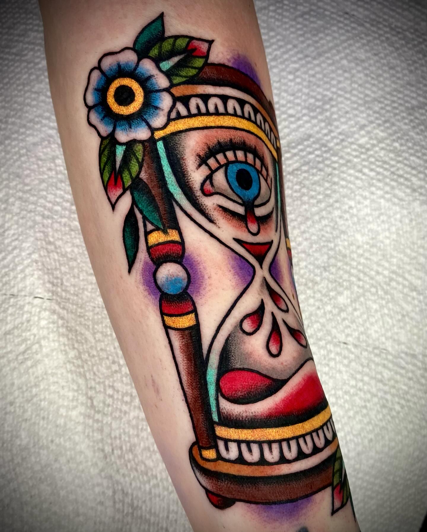 Hourglass American traditional tattoo on the forearm by Zach Knisley (Wiz)