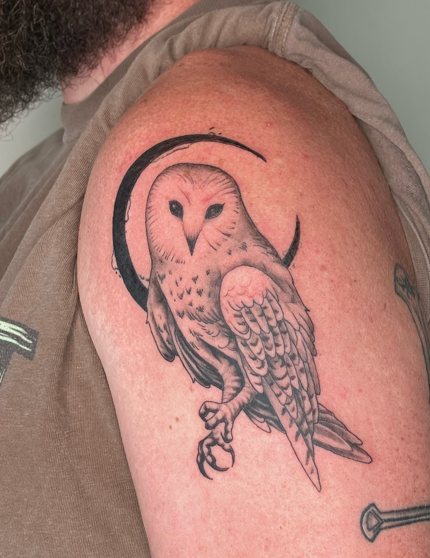 Owl realism tattoo on the shoulder by Hunter McGinnis