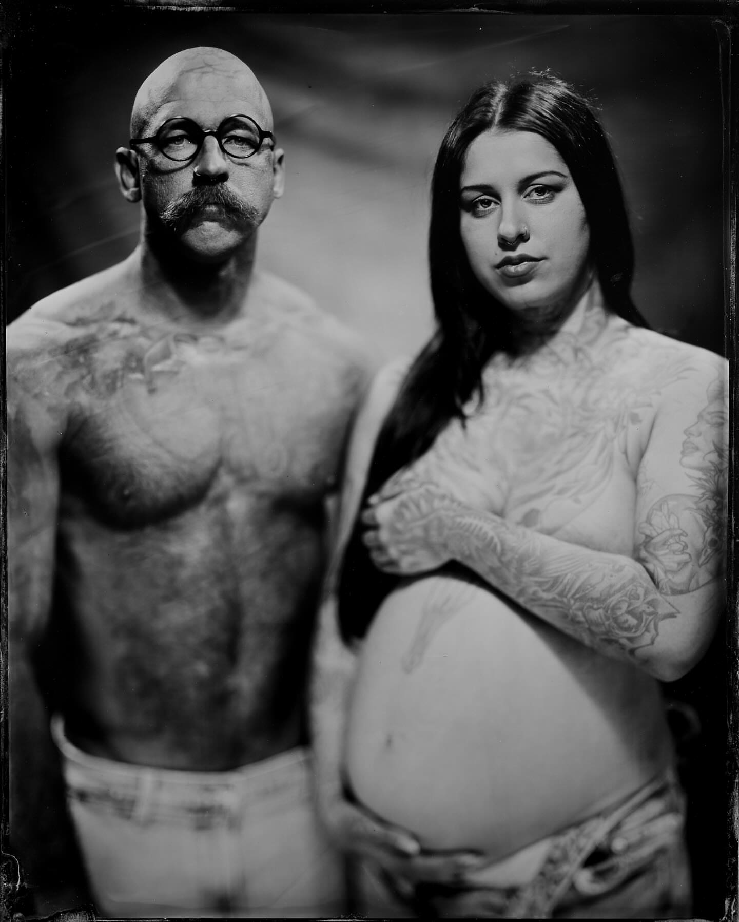 Tattooed couple black and grey tattoo on the torso by Zoe D