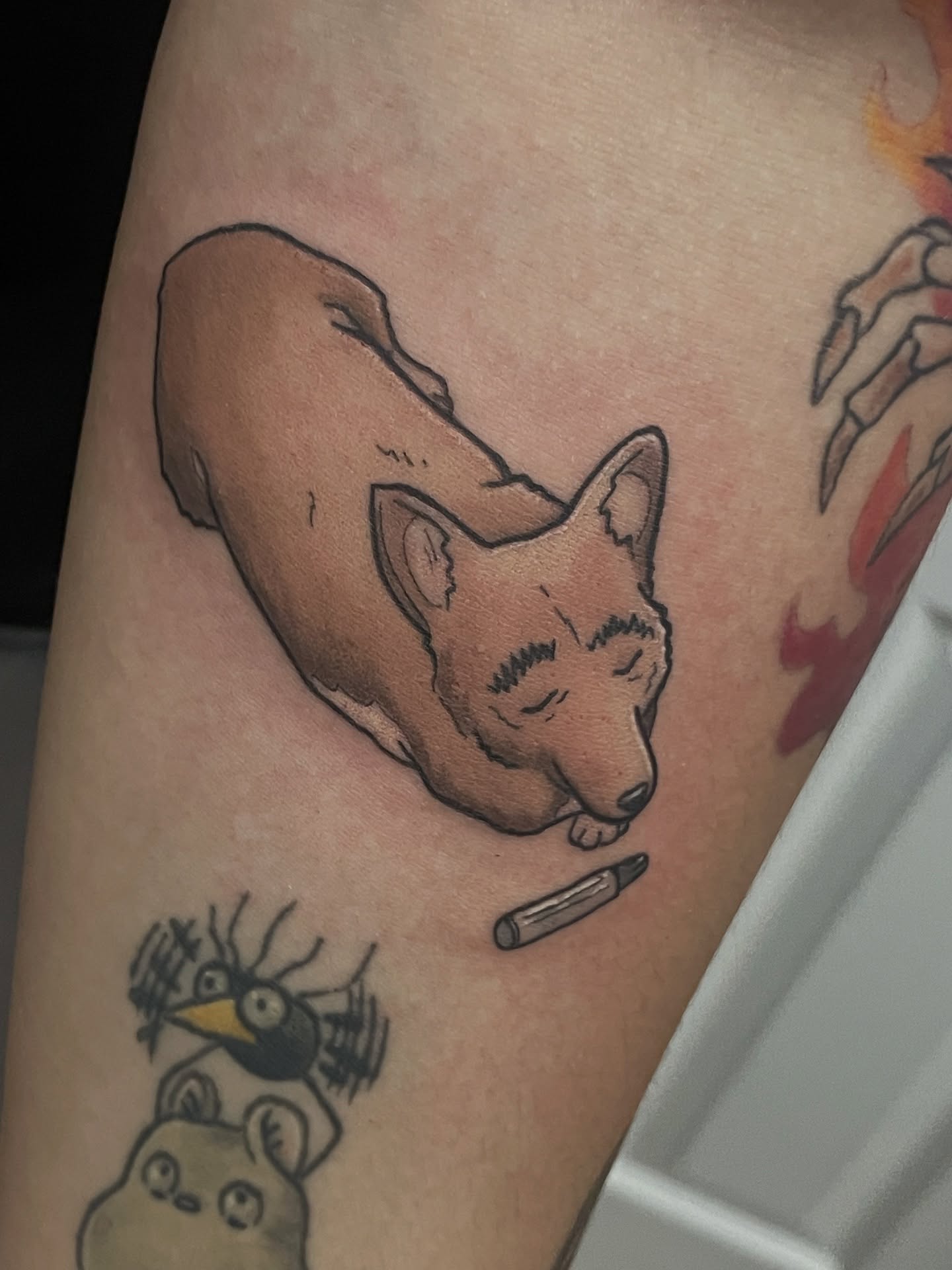Sleeping dog realism tattoo on the forearm by 𝑲𝒂𝒊𝒕 𝑨𝒏𝒅𝒆𝒓𝒔𝒆𝒏