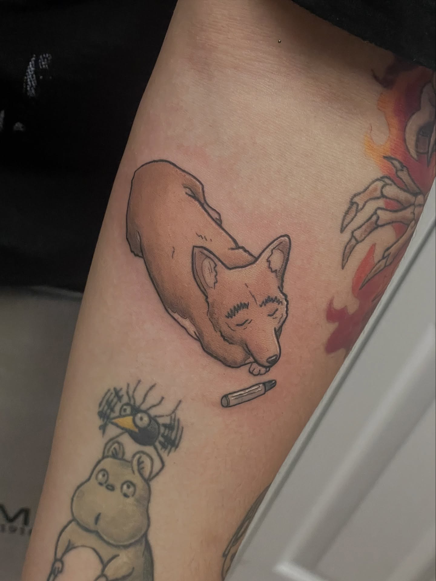 Sleeping dog realism tattoo on the forearm by 𝑲𝒂𝒊𝒕 𝑨𝒏𝒅𝒆𝒓𝒔𝒆𝒏