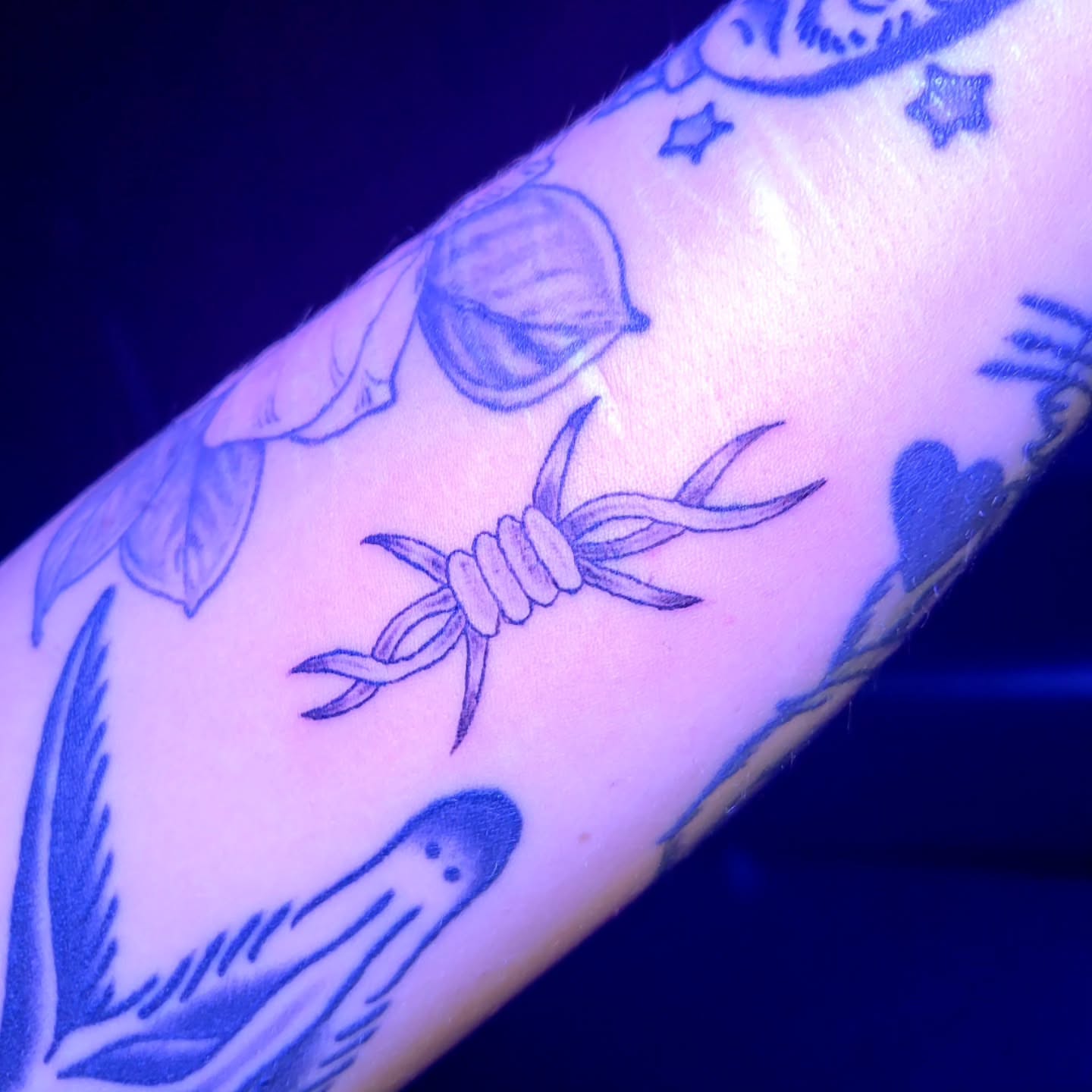 Knot and leaves American traditional tattoo on the forearm by Kyle - Portland Oregon Tattoo Artist