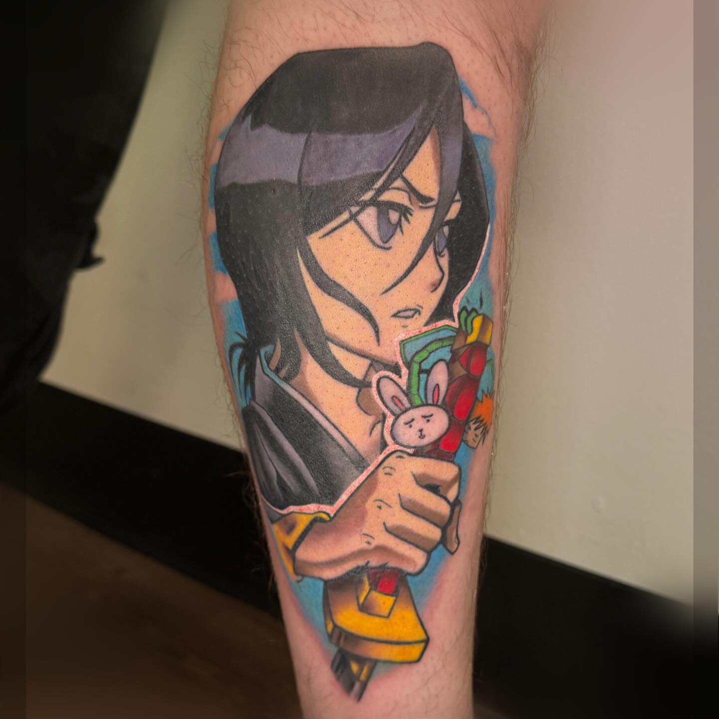 Anime character anime tattoo on the forearm by Romans