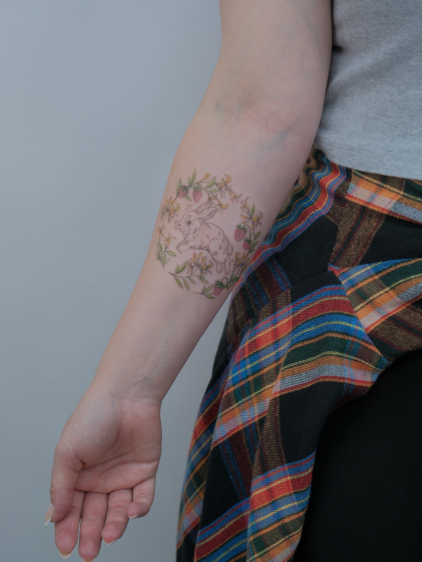 Rabbit and floral American traditional tattoo on the forearm by Tattoo in Charlotte NC, Charlotte, North Carolina
