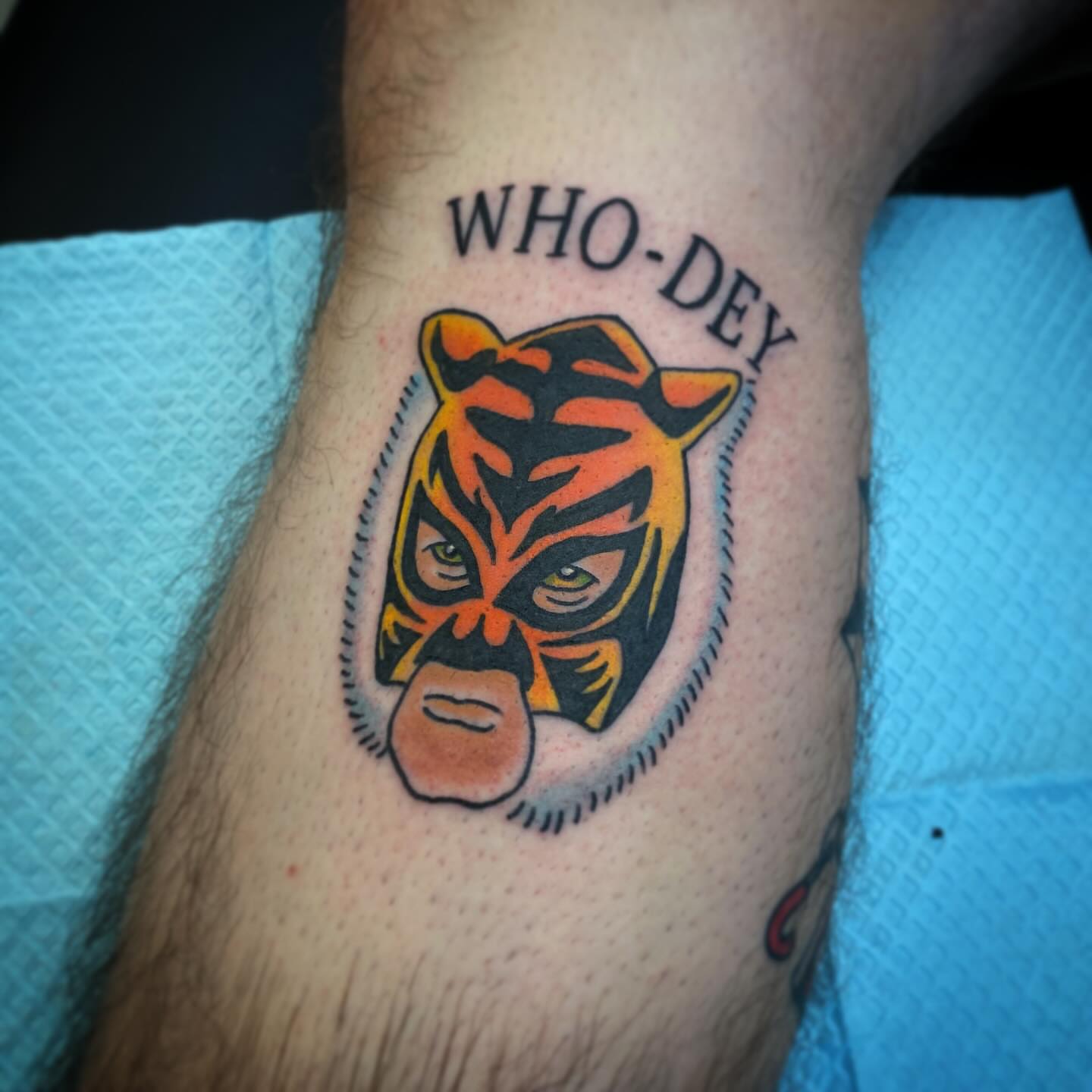 Mask American traditional tattoo on the forearm by Kyle Mitchell, Cincinnati
