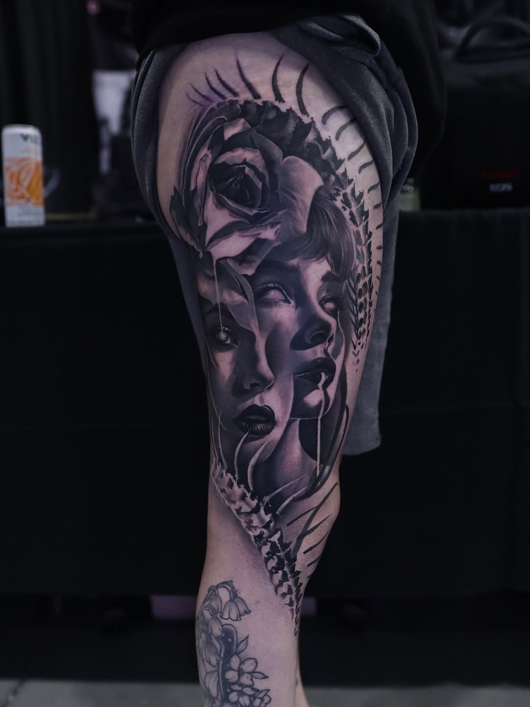 Surreal portrait with rose realism tattoo on the forearm by Naomi Burke, New Westminster, British Columbia