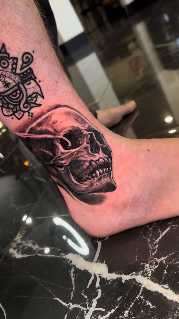 Skull with ornamental elements dark realism tattoo by Danny Aceves ✨ San Diego tattoo artist