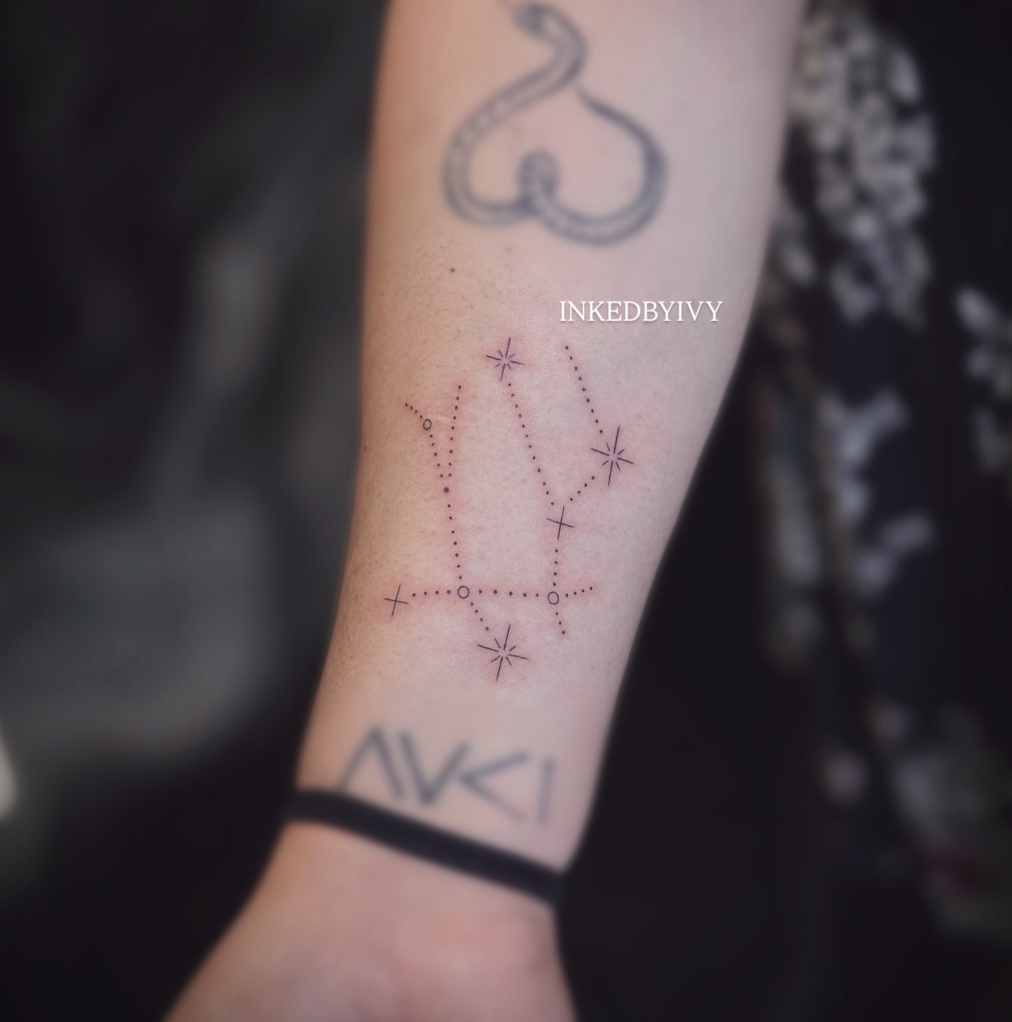 Constellation dotwork tattoo on the forearm by IVY
