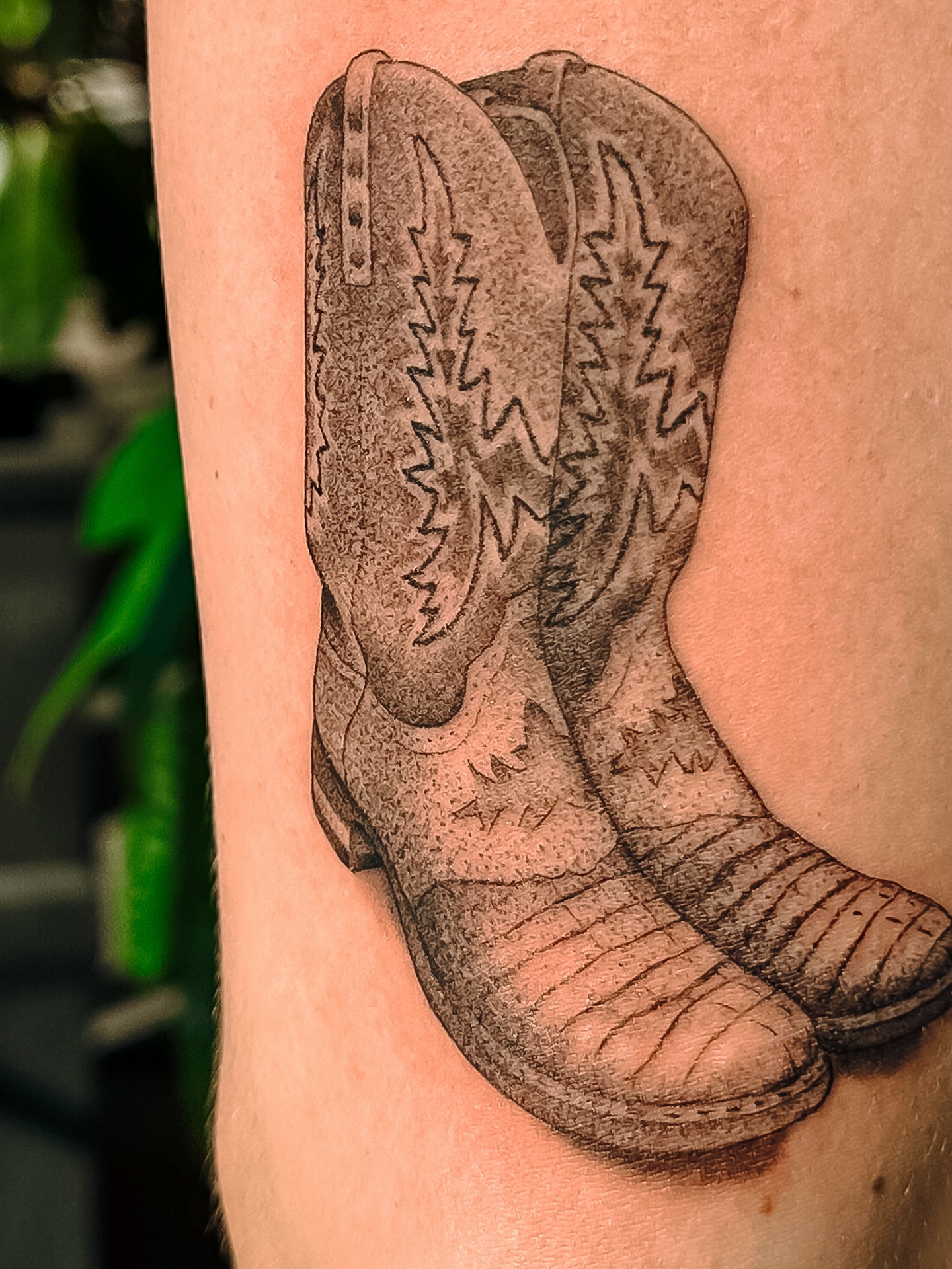 Cowboy boots black and grey tattoo on the forearm by James Hix - Tattoo Artist, Fort Worth, Texas