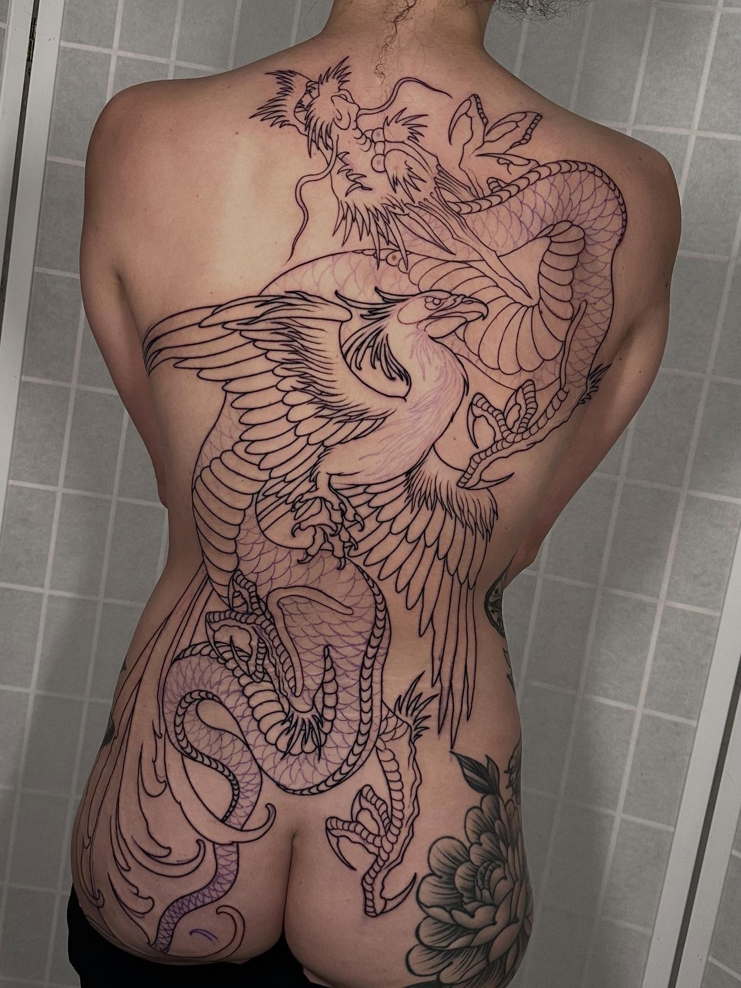 Phoenix and dragon black and grey tattoo on the back by Henry Gaßner