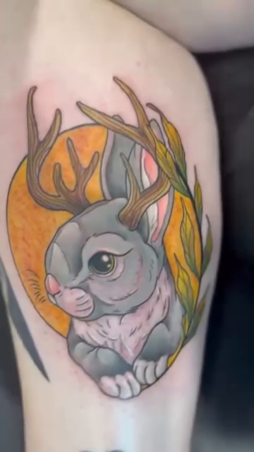 Rabbit with antlers fine line tattoo on the upper arm by Ben Cecil, Summerville, South Carolina