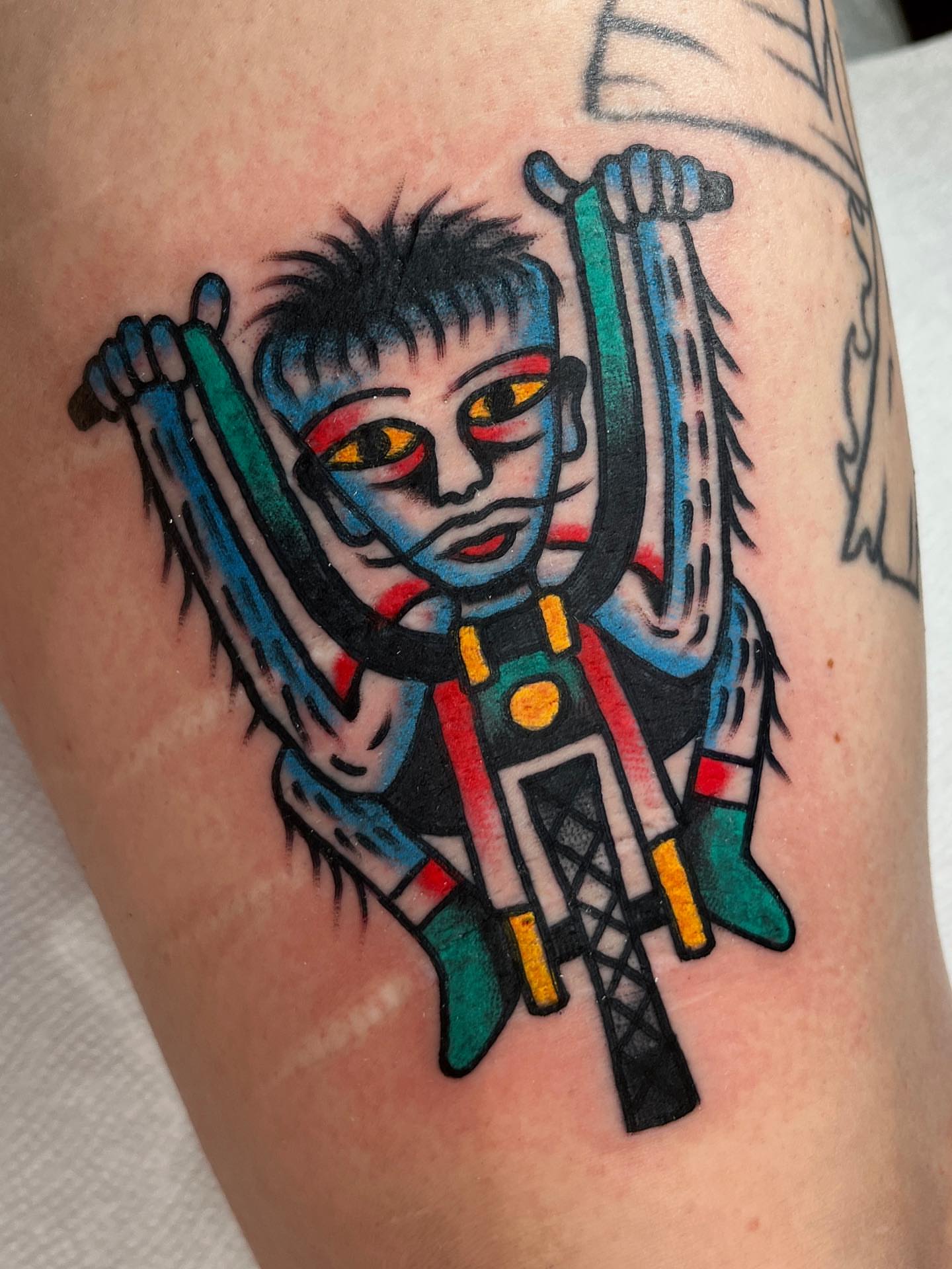 Anime character anime tattoo on the thigh by Charlie Ostrom, Durham, North Carolina
