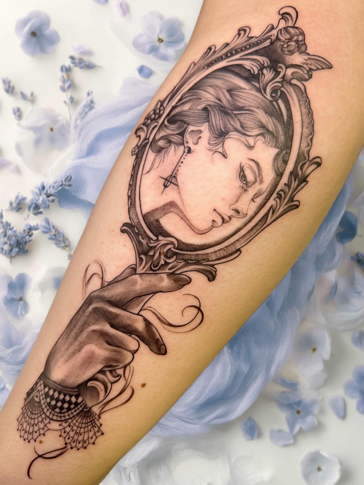 Woman in mirror realism tattoo on the forearm by Izzi 🧿 Htx