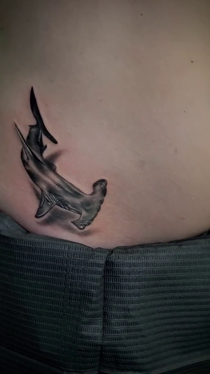 Hammerhead shark tattoo fine line tattoo on the ribs by William Gualteros
