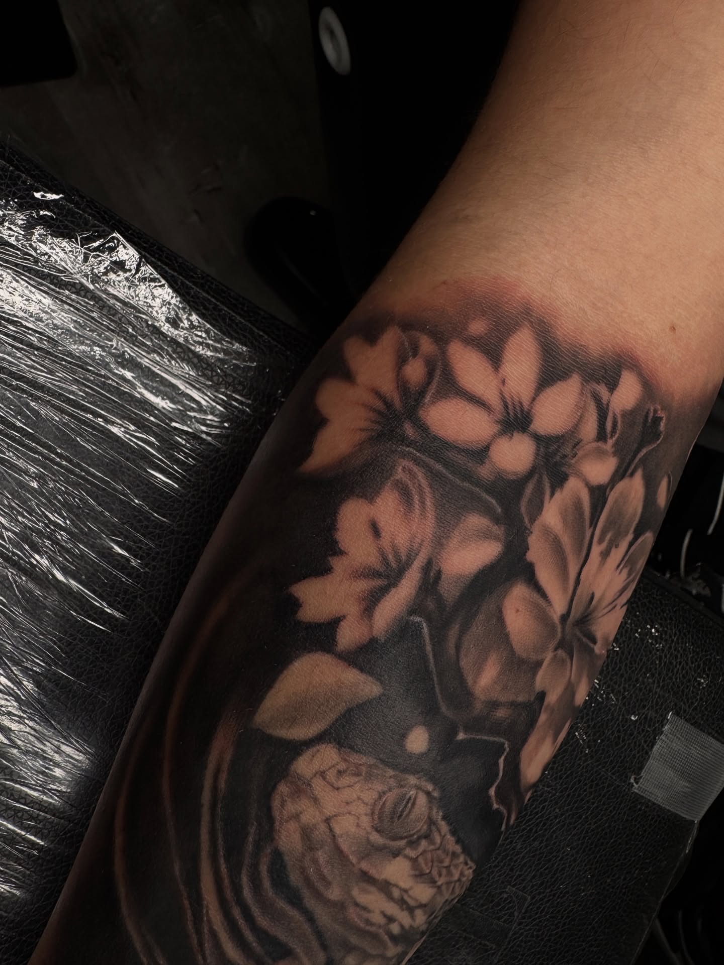 Flowers black and grey tattoo on the forearm by Visionary🌌