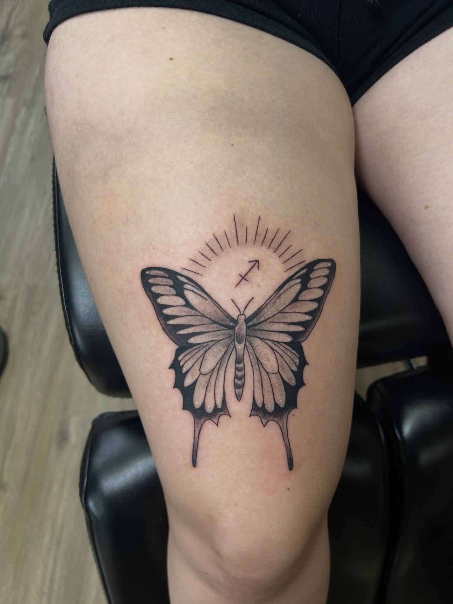 Butterfly black and grey tattoo on the thigh by Jessica π