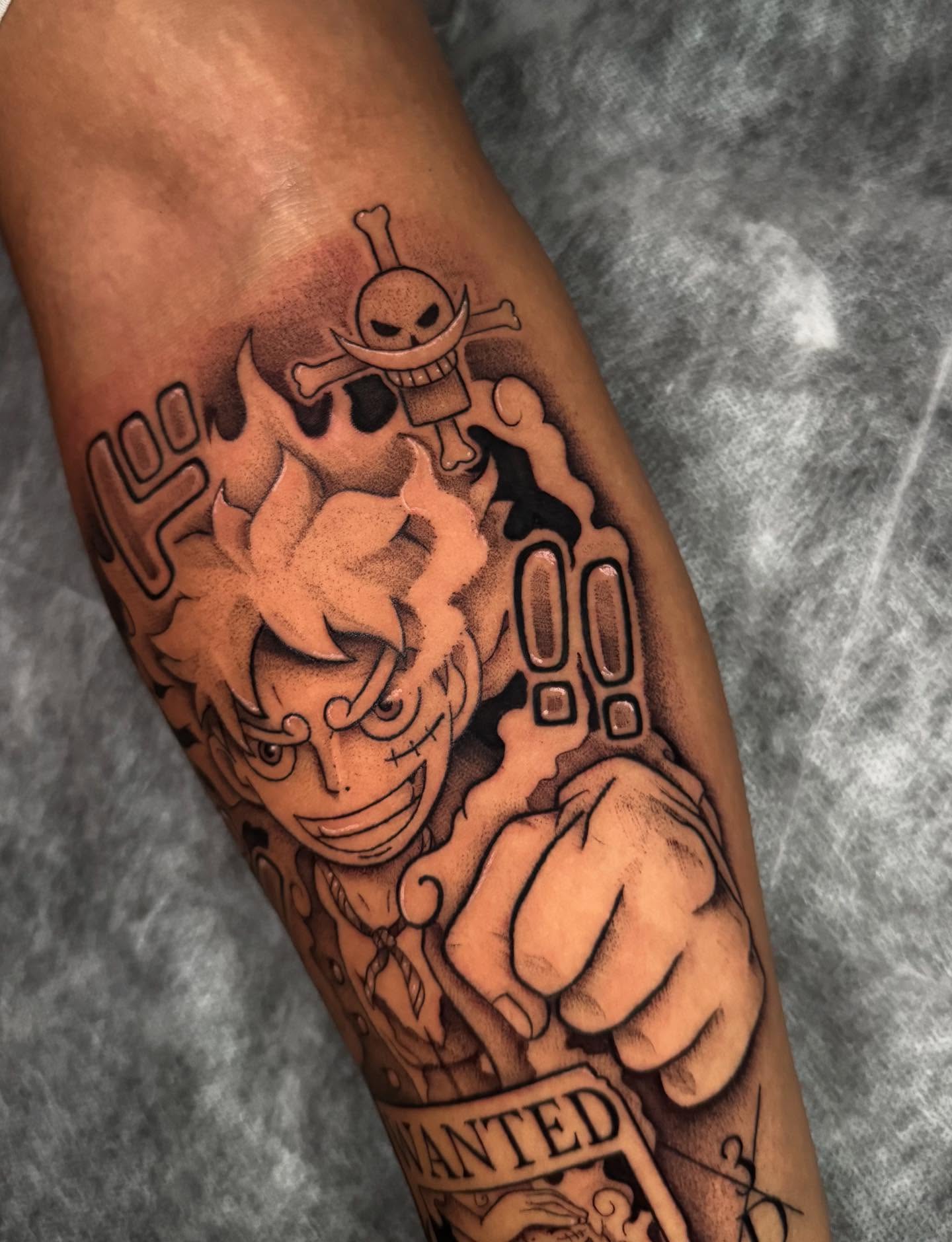 Monkey D. Luffy anime tattoo on the forearm by kelsey hackett
