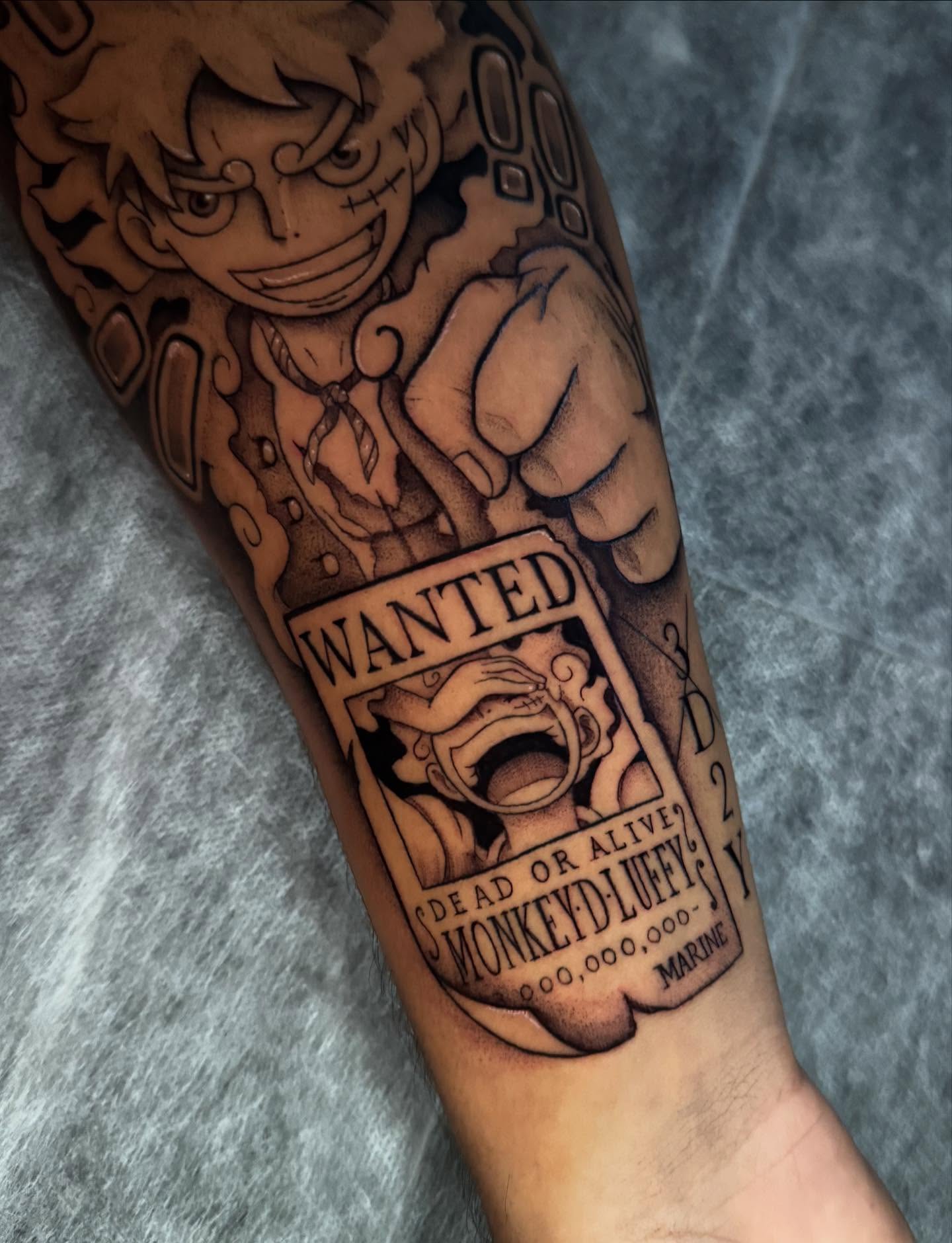 Monkey D. Luffy anime tattoo on the forearm by kelsey hackett