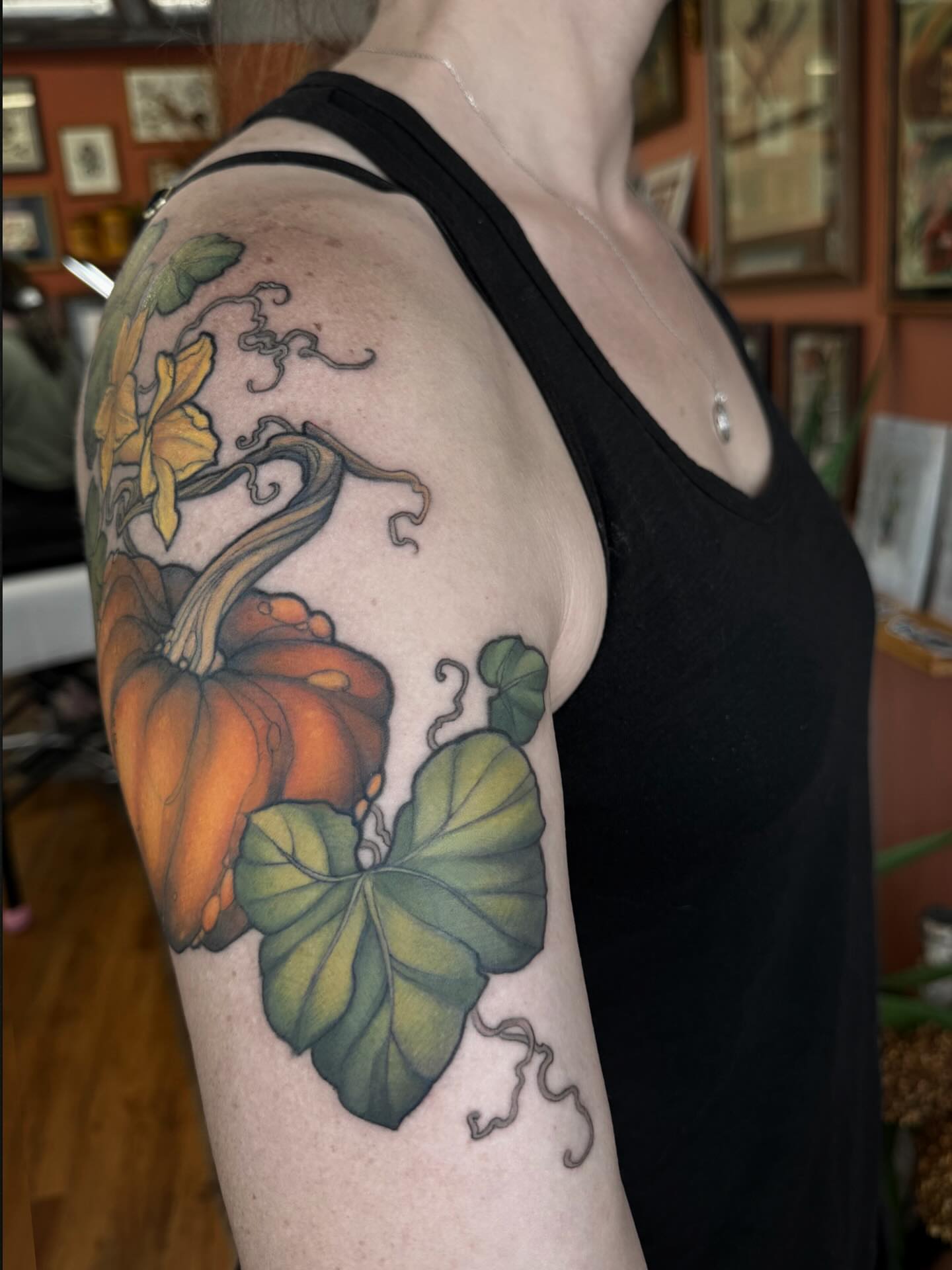 Pumpkin vine realism tattoo on the upper arm by β₯πΈππͺπ€π€π ππβπππβ₯