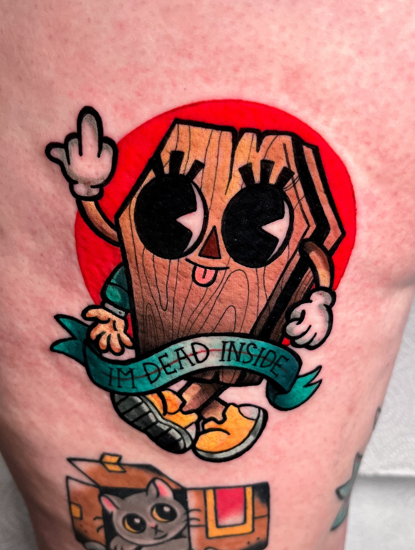 Wooden character American traditional tattoo on the thigh by ʙᴇᴄᴄᴀ ʟʏɴɴ