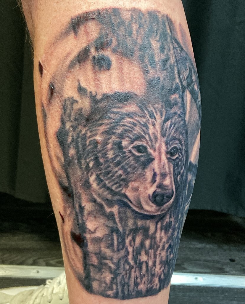 Bear realism tattoo on the forearm by Erin McGloin