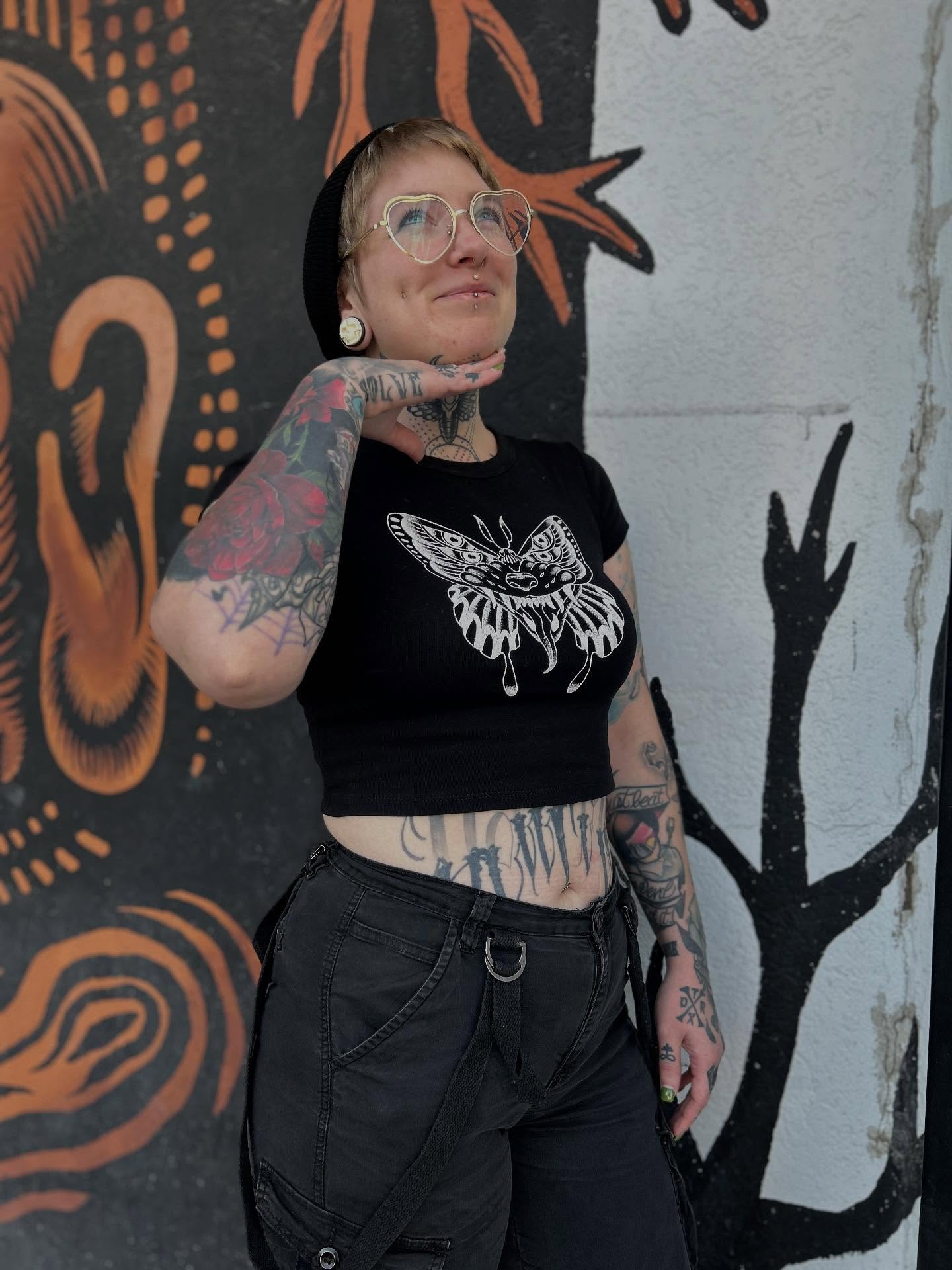 Butterfly American traditional tattoo on the torso by Holle Hellfire