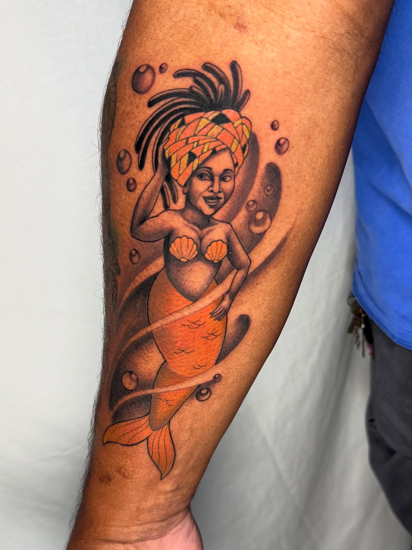 Mermaid American traditional tattoo on the forearm by Pat Patterson Florida Tattoo Artist