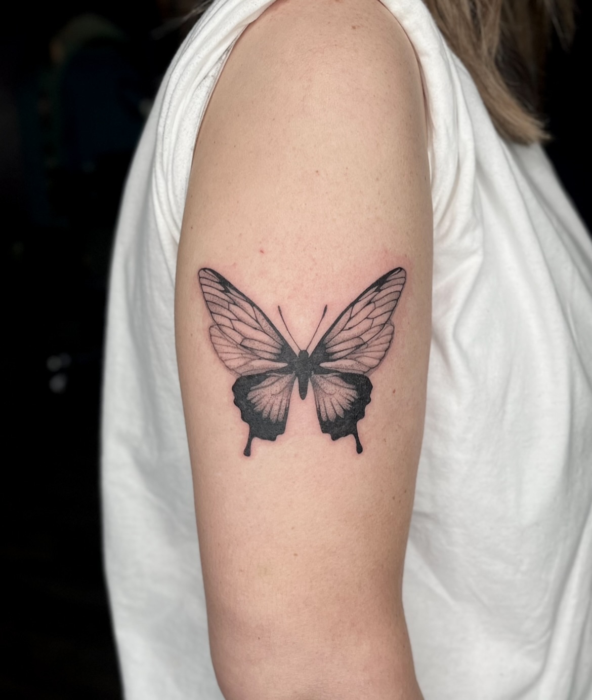 Butterfly black and grey tattoo on the upper arm by ✩gracie ⋆｡°✩
