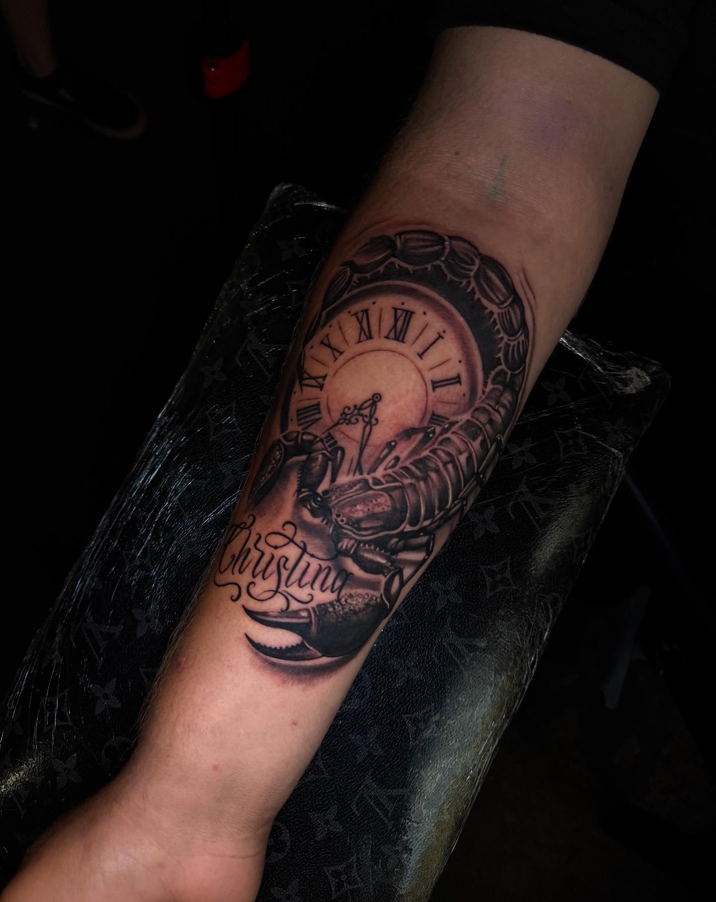 Clock realism tattoo on the forearm by Smuk One