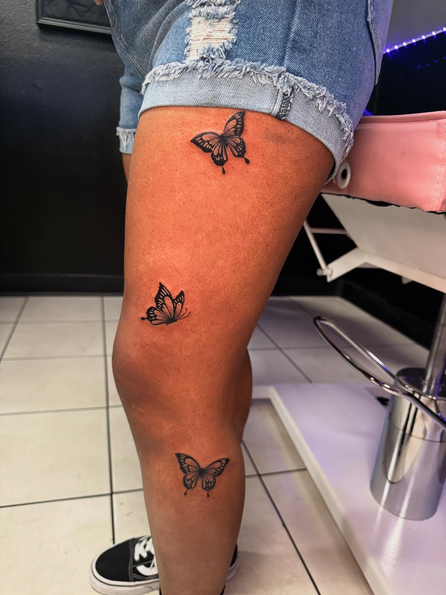 Butterfly black and grey tattoo on the leg by Jasmin Lozano