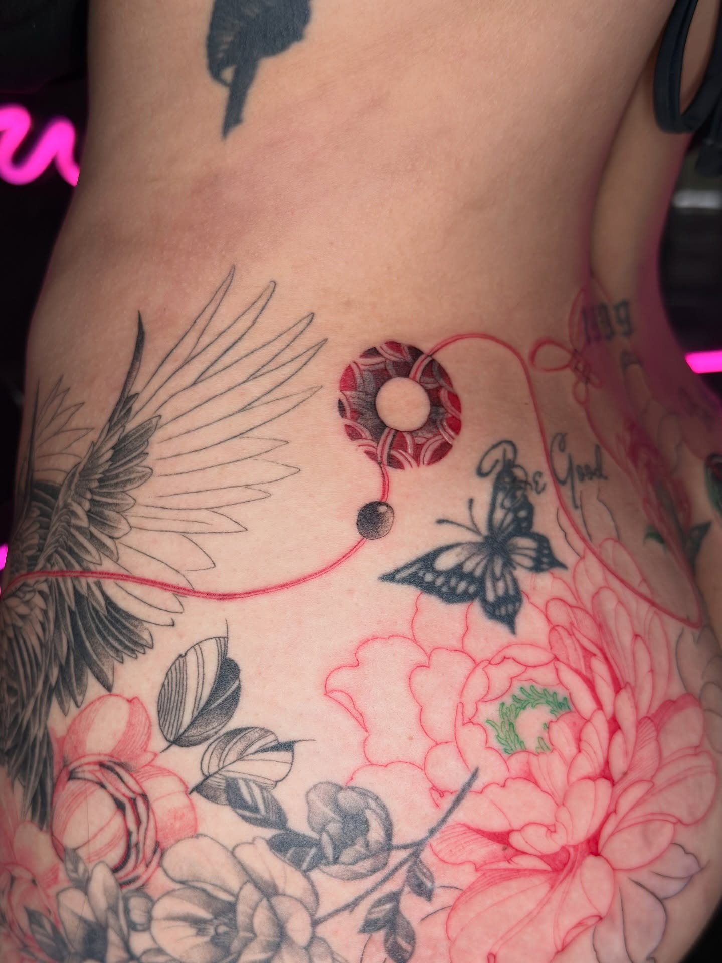 Floral and butterfly new school tattoo on the ribs by B o n d B o n d , “ a r t i s t “