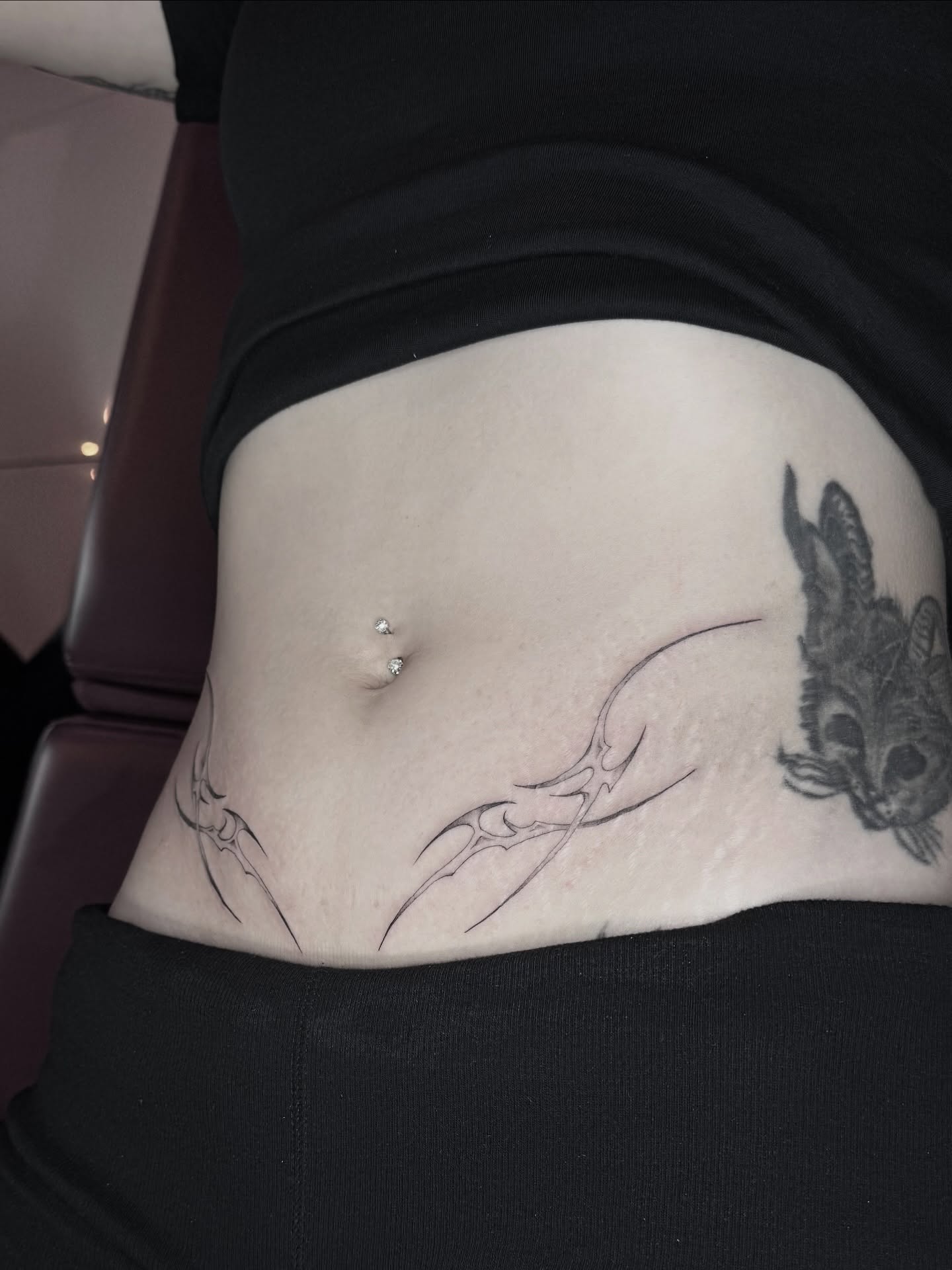 Claw black and grey tattoo on the torso by B o n d B o n d , “ a r t i s t “