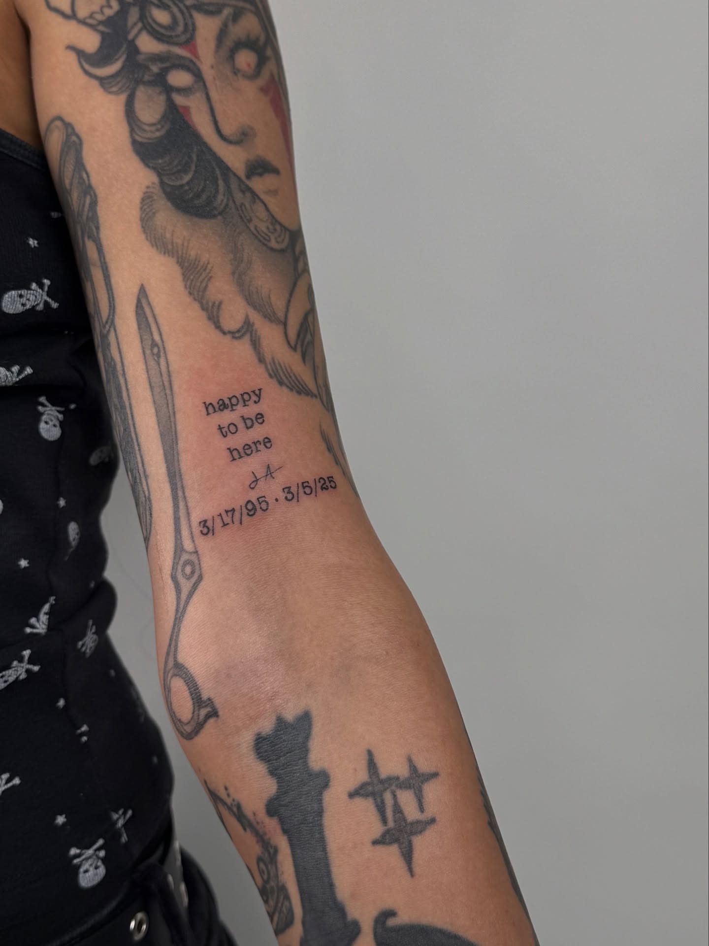 Scissors and Medusa American traditional tattoo on the forearm by sabina