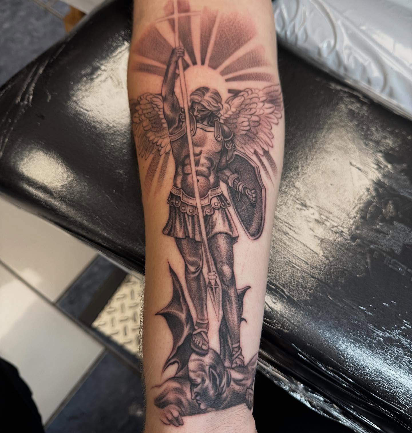 Angelic warrior realism tattoo on the forearm by Carla V