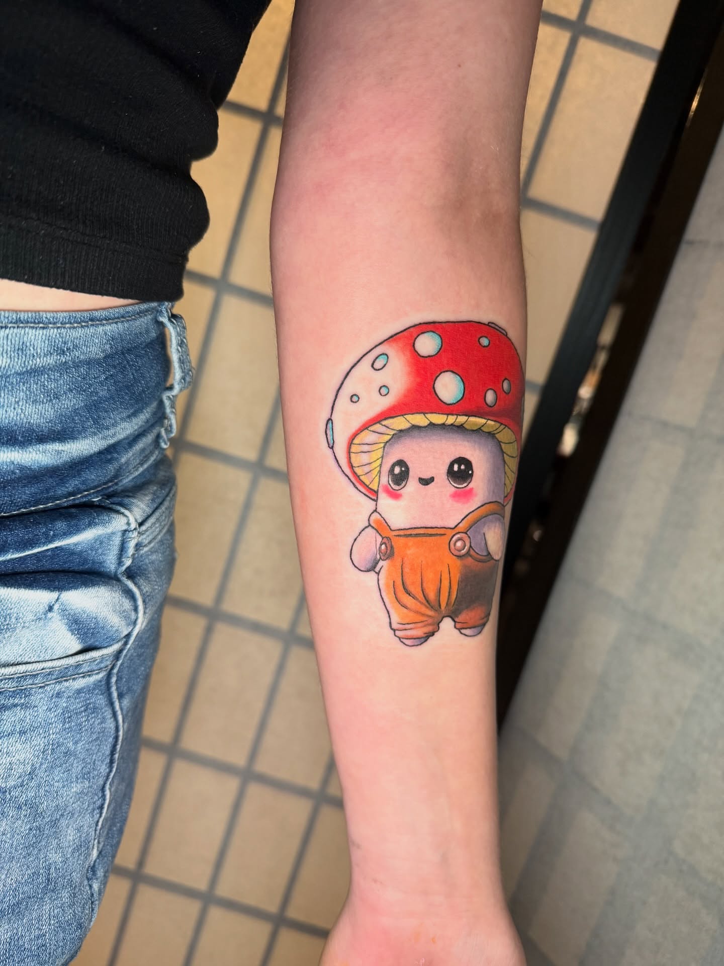 Mushroom character dotwork tattoo on the forearm by Austin Poliszuk, Minneapolis, Minnesota