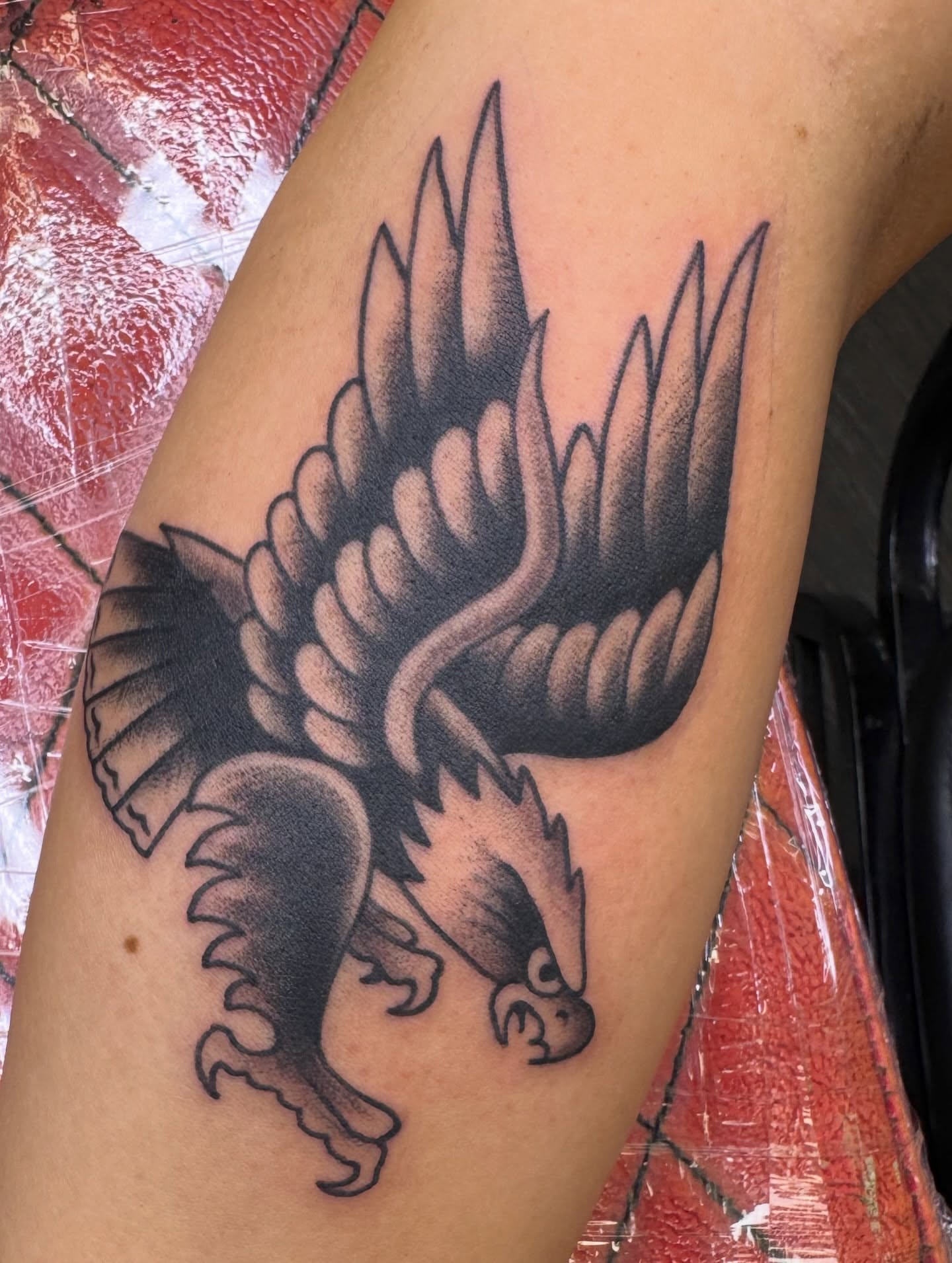 Eagle American traditional tattoo on the forearm by Ben Karnofsky