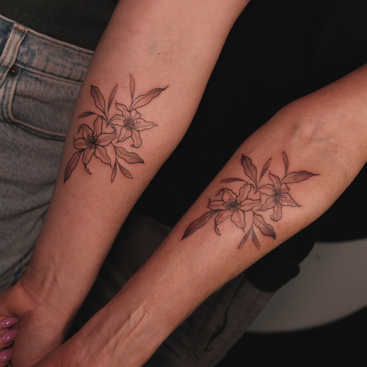 Flowers black and grey tattoo on the forearm by Velvet, Seattle, Washington