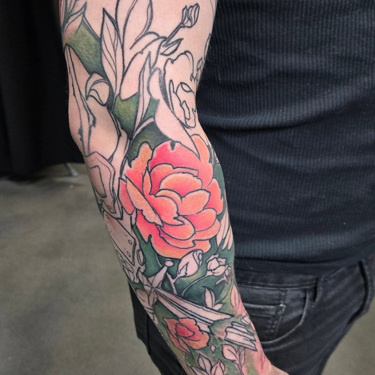 Floral bouquet American traditional tattoo on the forearm by Jamie Clinton
