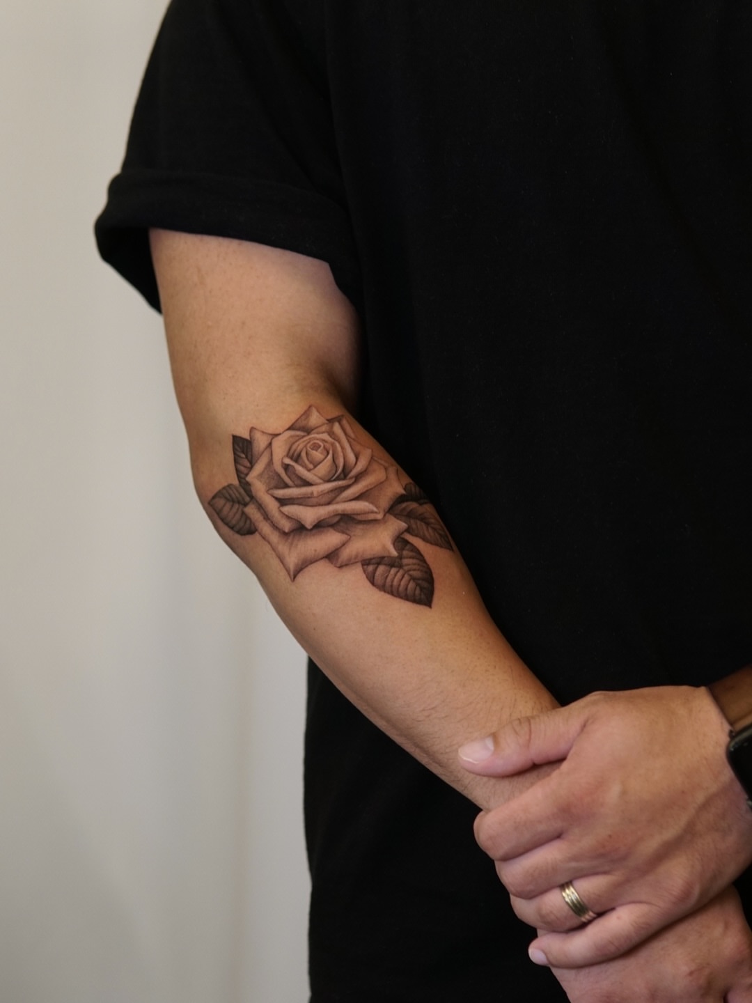 Rose realism tattoo on the forearm by Ray Quinday