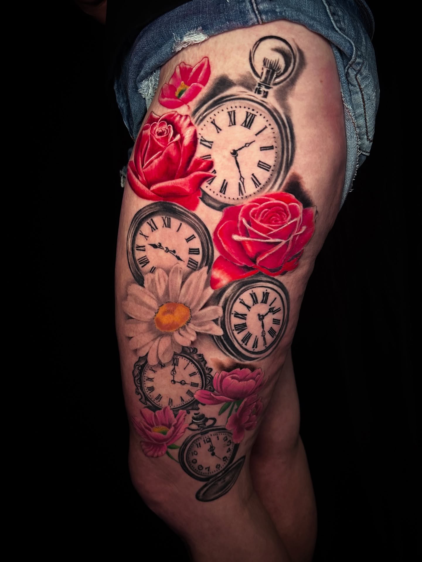 Clocks and roses realism tattoo on the thigh by Tattoo Artist - the Goat
