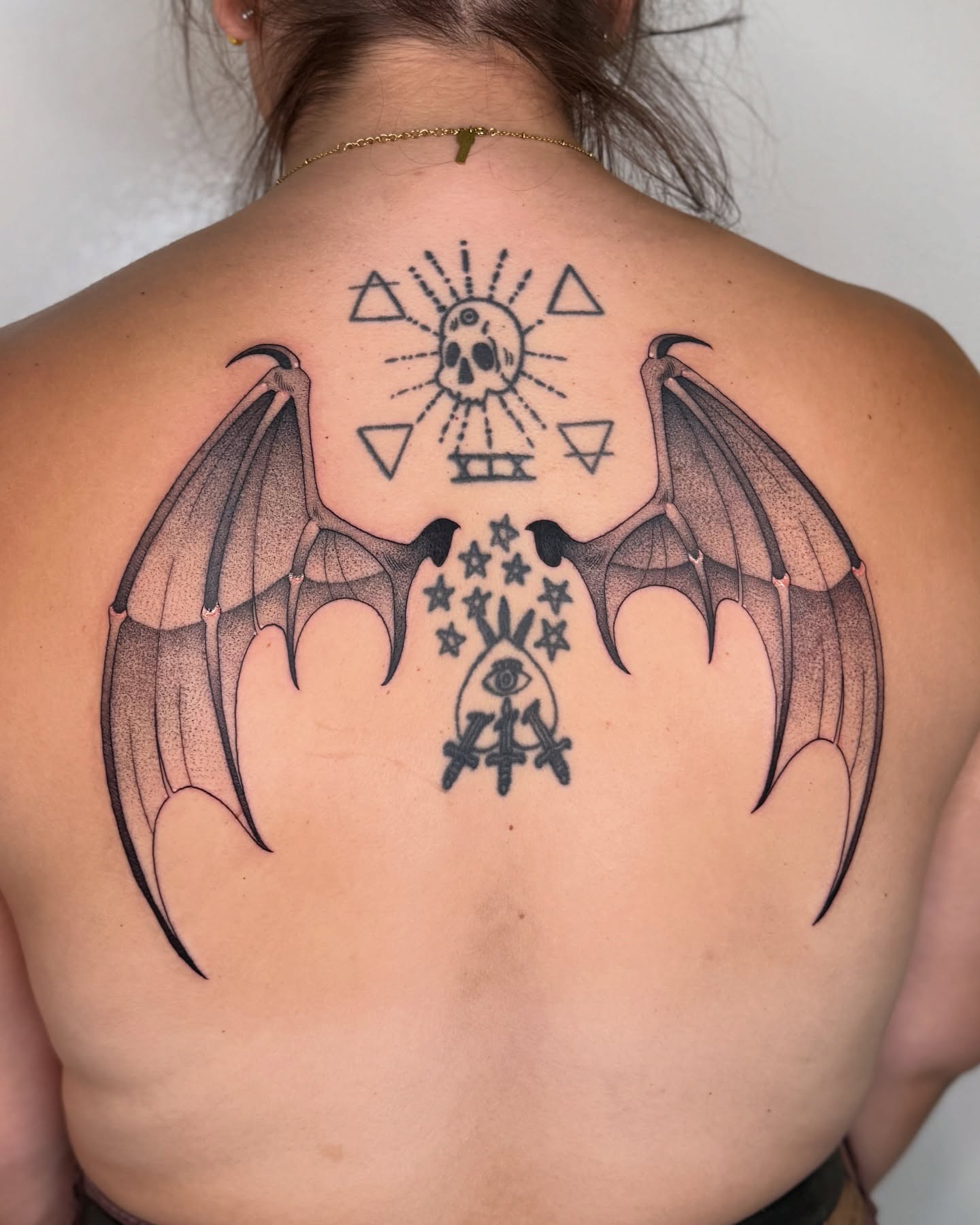 Tattoo by @deerbatstats — dotwork, geometric