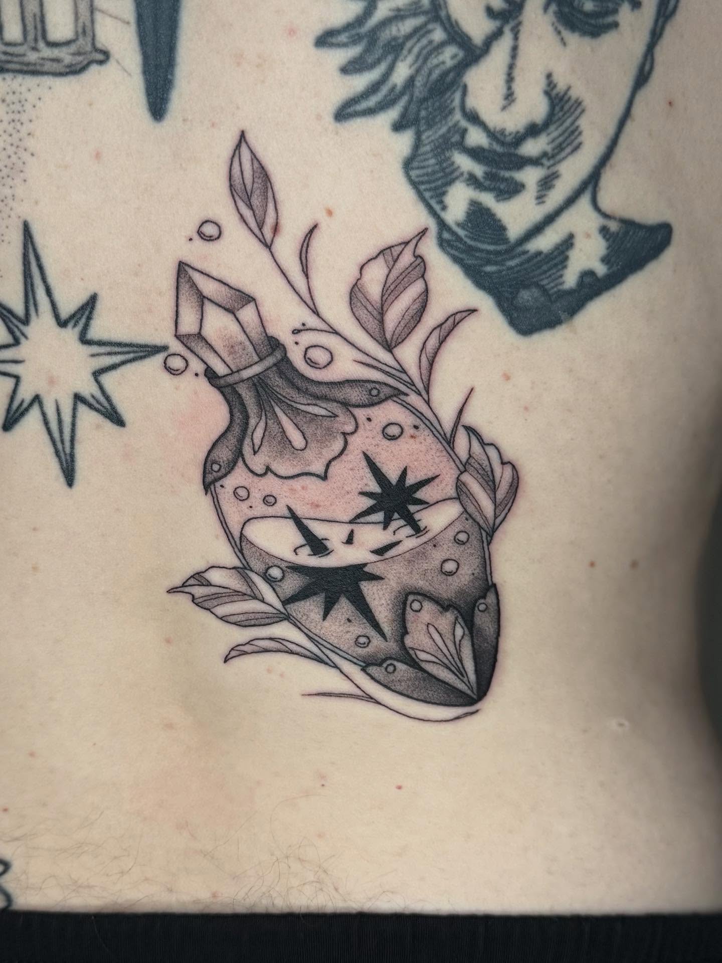 Glass bottle with stars black and grey tattoo on the torso by Brandi 🕷, Mentor, Ohio