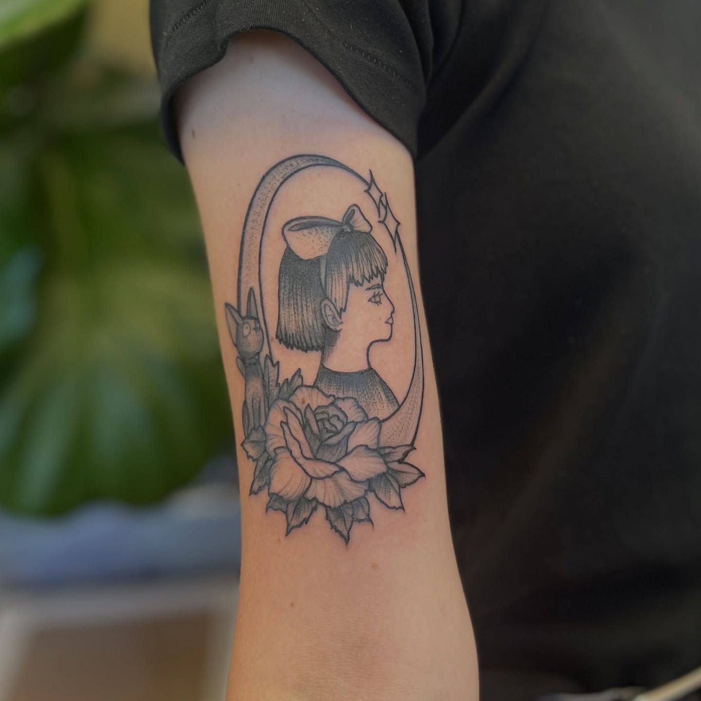 Woman with hat and roses realism tattoo on the forearm by Garden Glow Tattoo