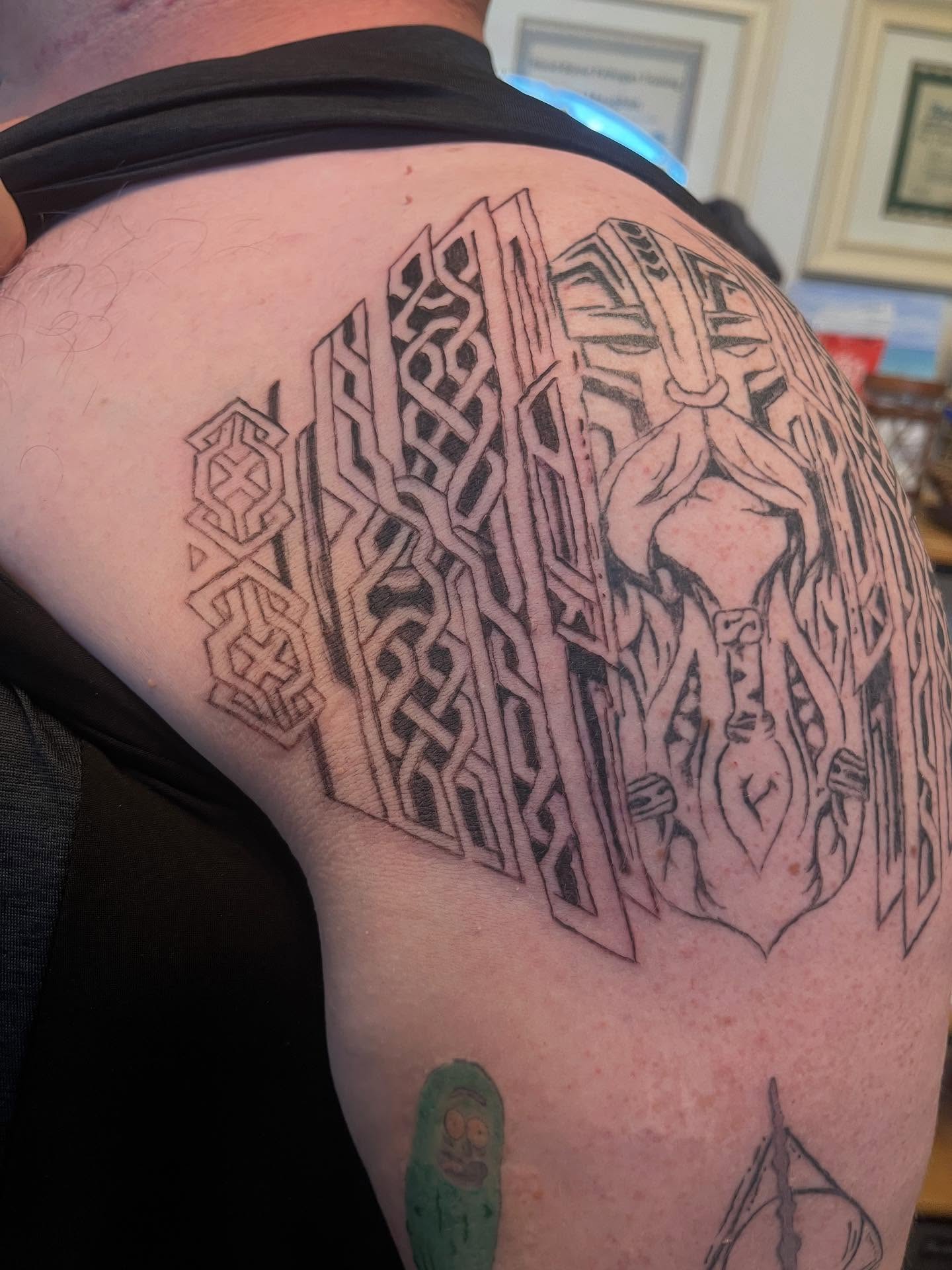 Geometric geometric tattoo on the shoulder by Val Maughan